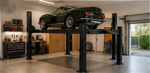Four-post lift holding a classic sports car in a tidy home garage